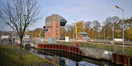 To the big Weir at the Weser river and huge barges lock