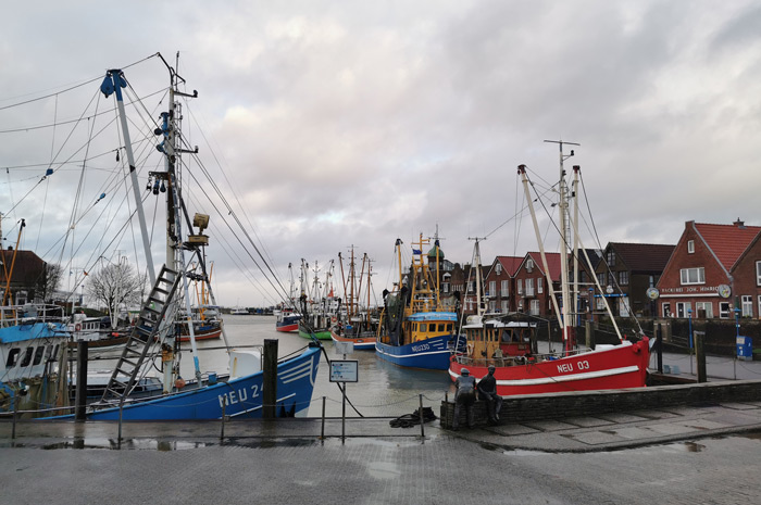Neuharlingersiel - a colorful fishing port in the storm