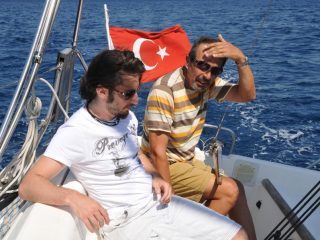 Sailing along Izmir coastline with friend