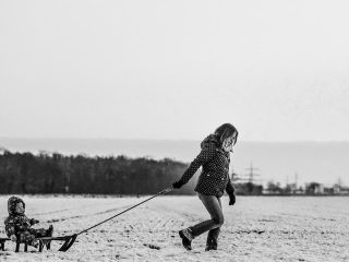 Hiking in the snow with sledge