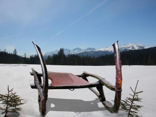 Hiking in the snow with sledge