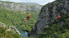 Adventure on the Zip Line high above the river Cetina