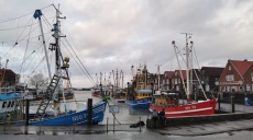 Neuharlingersiel - a colorful fishing port in the storm