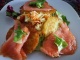Smoked salmon on potato pancakes - dressed with a colorful salad